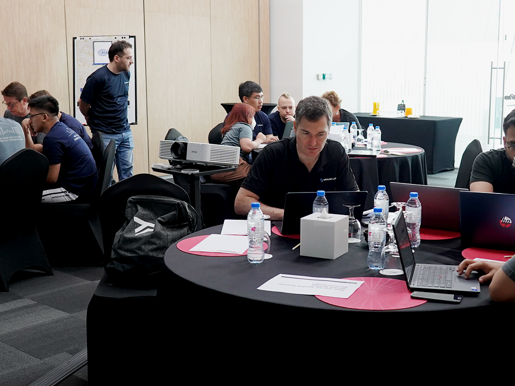 Company offsite — employees building expressions